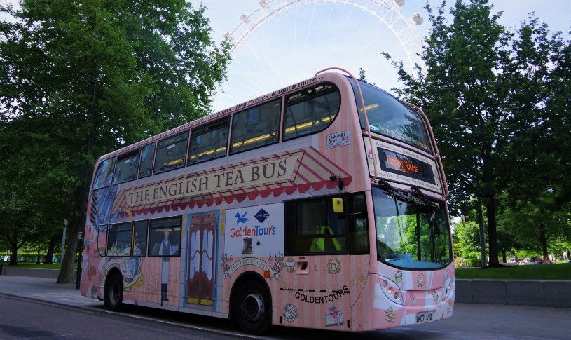 Side of Afternoon Tea Bus in front of London Eye