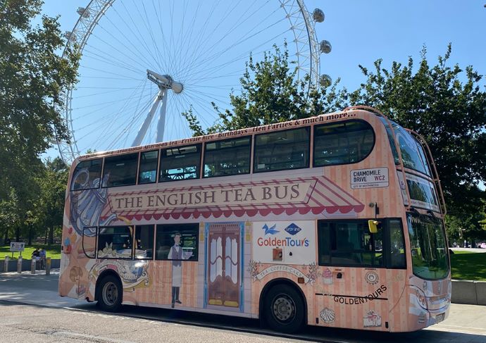 A photo of an afternoon tea bus, an idea for what to do for Mother's Day.
